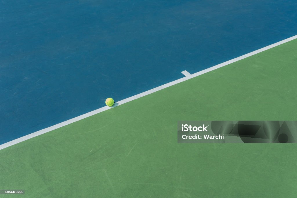 The ball is on the line Tennis ball on the field line meaning it is not out Tennis Stock Photo