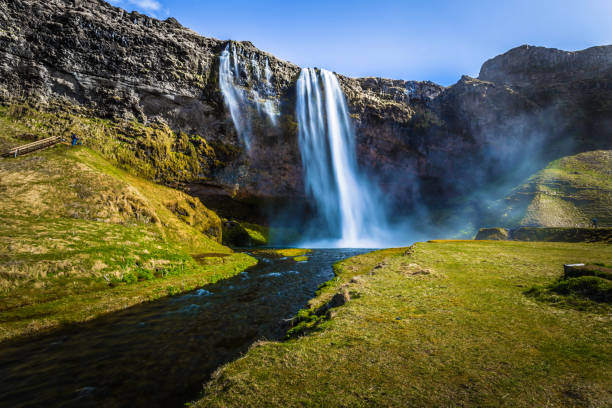 istock Seljalandsfoss - May 04, 2018: Seljalandsfoss waterfall, Iceland 1015604064
