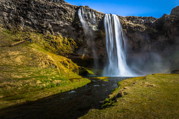 istock Seljalandsfoss - May 04, 2018: Seljalandsfoss waterfall, Iceland 1015604120