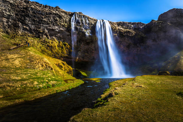 istock Seljalandsfoss - May 04, 2018: Seljalandsfoss waterfall, Iceland 1015604130