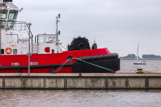 Tugboat bow with large tires.