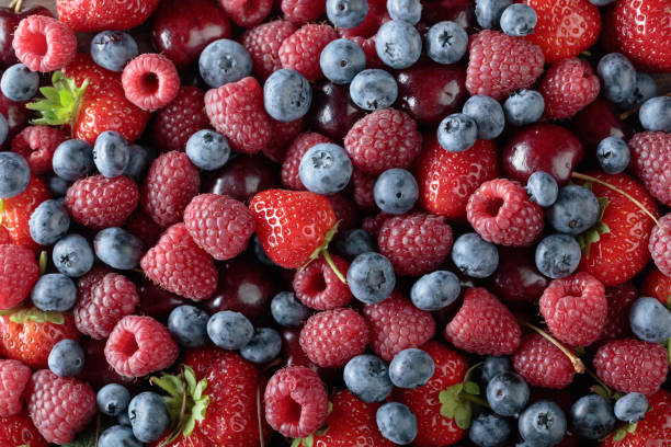 istock Berries closeup colorful assorted mix. 1015618840