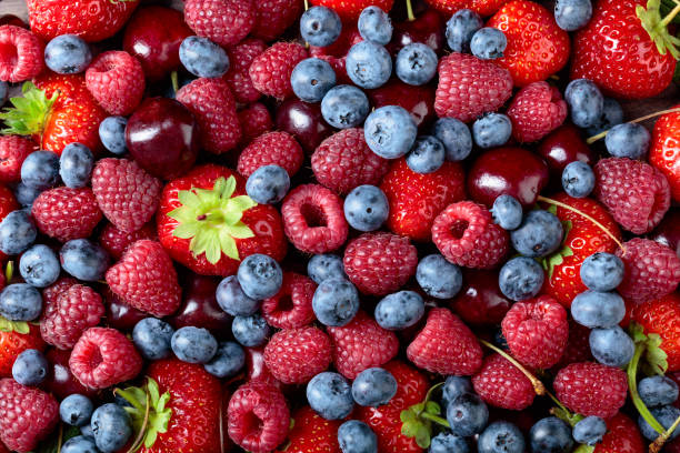 istock Berries closeup colorful assorted mix. 1015618870