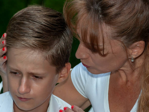 istock mother consoles the upset son 1015621192