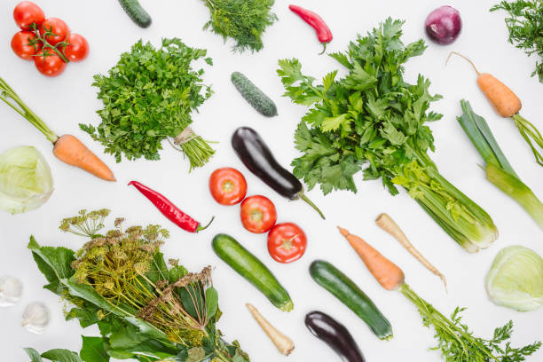 istock full frame of fresh autumn vegetables arranged isolated on white 1015632032
