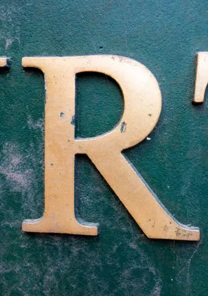 Written Wording in Distressed State Typography Found Letter