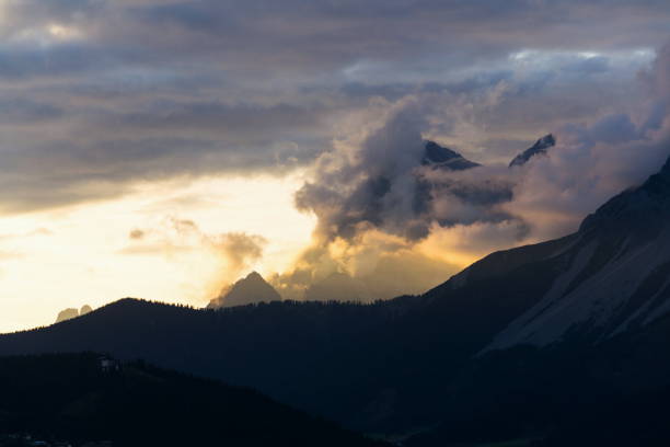 istock Beautiful sunset with dramatic clouds over Dachstein mountains range in Northern Limestone Alps, Schladming, romantic love peaceful meditation concept 1015649986