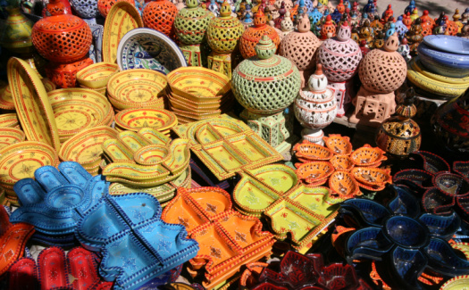Handmade clay dishes are sold at the fair