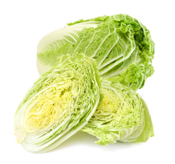 istock Whole and Slice of fresh chinese cabbage. Isolated on a white background 1015715770