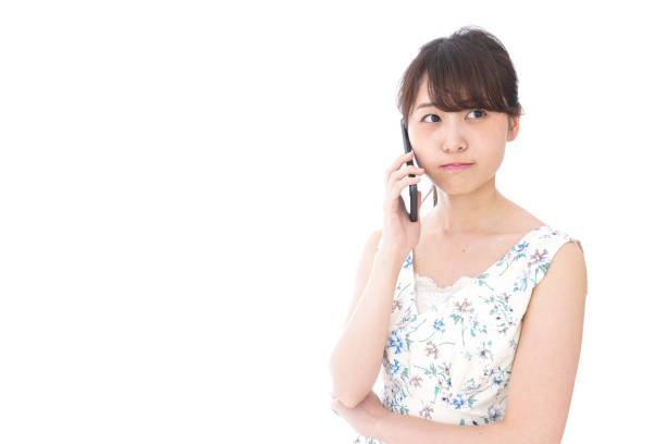 istock Young woman talking on smartphone 1015738142
