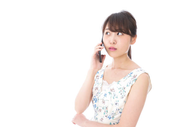 istock Young woman talking on smartphone 1015738174