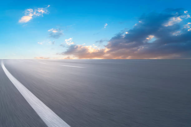 istock Asphalt road with sky clouds landscape 1015751978