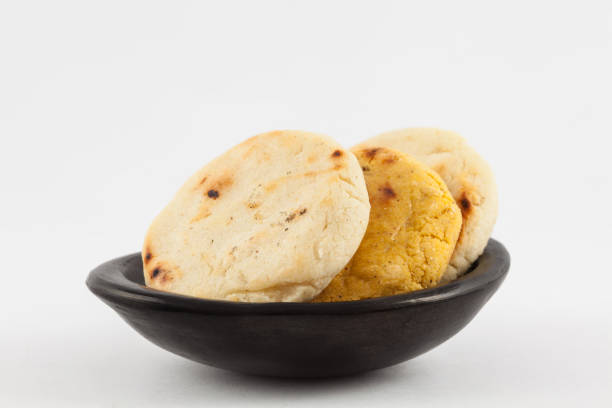 istock Roasted traditional South American corn arepa in a black ceramic dish 1015752058
