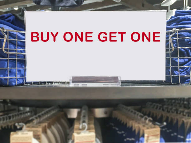 istock Buy one get one sign at store 1015757610