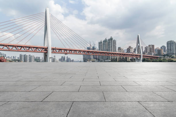 istock Urban,skyscrapers,with,empty,square,floor,tiles 1015757660