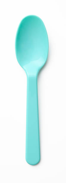 istock Isolated shot of blue plastic spoon on white background 1015762318