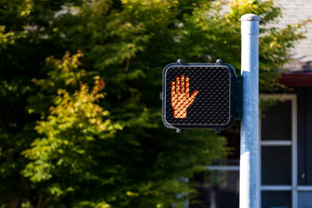 istock Crosswalk hand symbol sign on a post 1015765512
