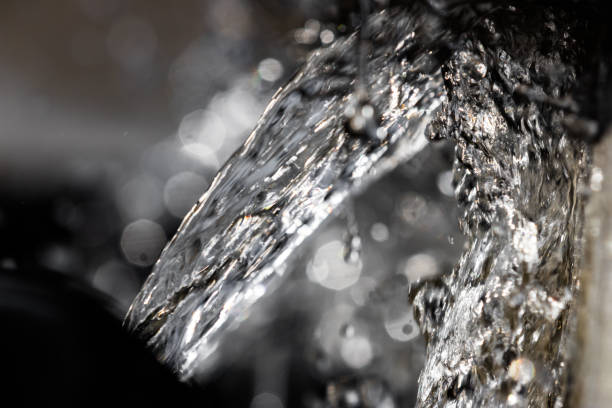 istock Water fountain close up splashing and falling 1015765532