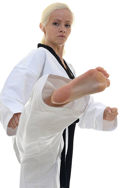 student of tae kwon делают - martial arts women tae kwon do black belt стоковые фото и изображения