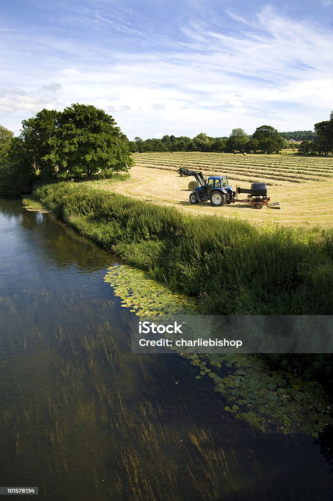 Harvesting in the English countryside  Machine Part Stock Photo