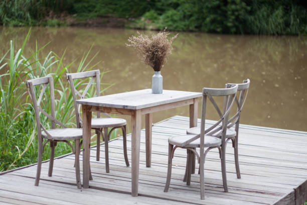 istock Wooden tables outside coffee shop 1015782410