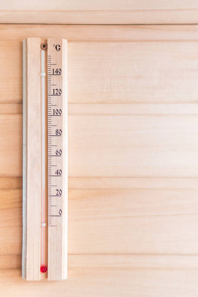 istock Thermometer on a wooden wall 1015787584