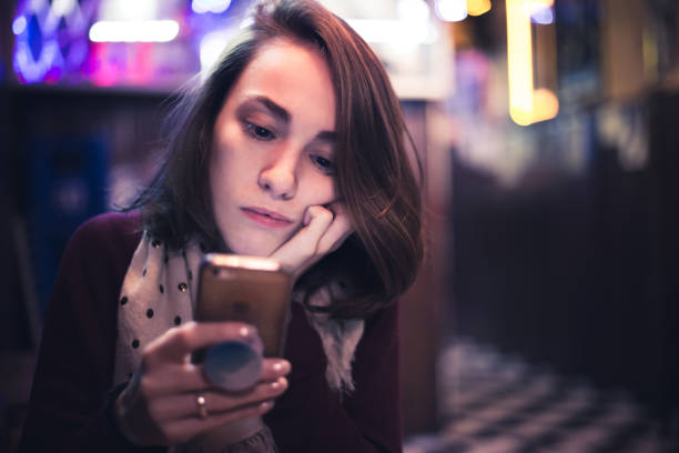 istock Girl in a bar 1015790022