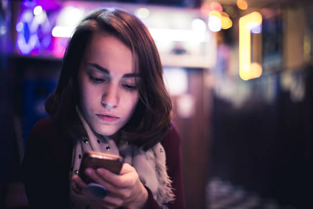 istock Girl in a bar 1015791814