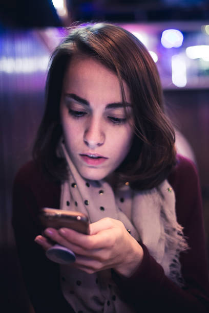 istock Girl in a bar 1015792074