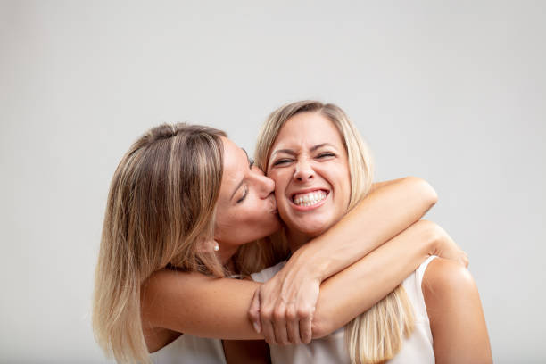 istock Affectionate woman hugging her friend or partner 1015792080