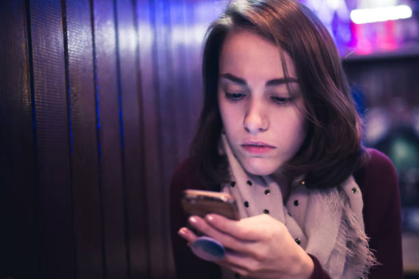 istock Girl in a bar 1015792090