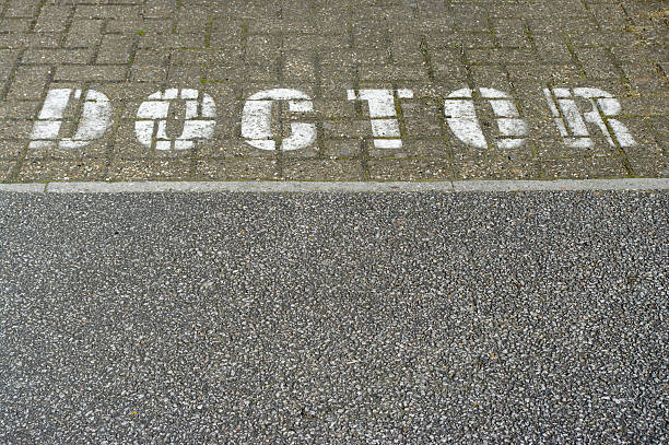 istock Doctor Sign Painted On Parking Space 101580286