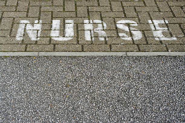 istock Nurse Sign Painted On Parking Space 101580291