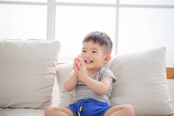 istock cute little boy smile happily 1015818010