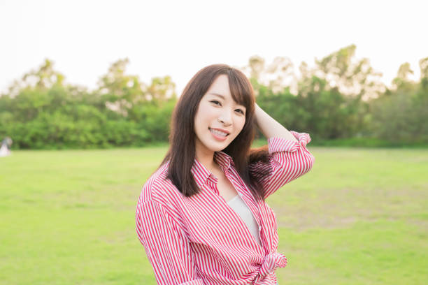 istock woman smile happily 1015820254