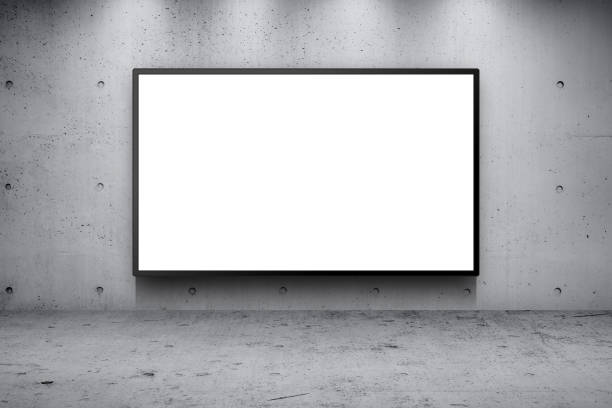 istock Blank advertising billboard led panel on concrete wall building street roadside background 1015823102