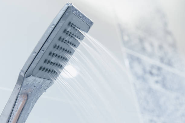 istock Low pressure problem shower head in bathroom clean new modern design 1015823176