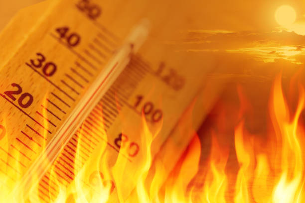 global warming climate change sign high temperature thermometer fire concept - flaming hot imagens e fotografias de stock