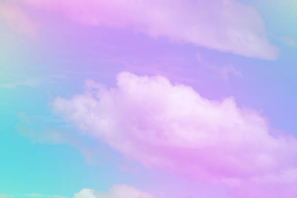 istock Sweet pastel colored cloud and sky with sun light, soft cloudy with gradient pastel color background. 1015823840