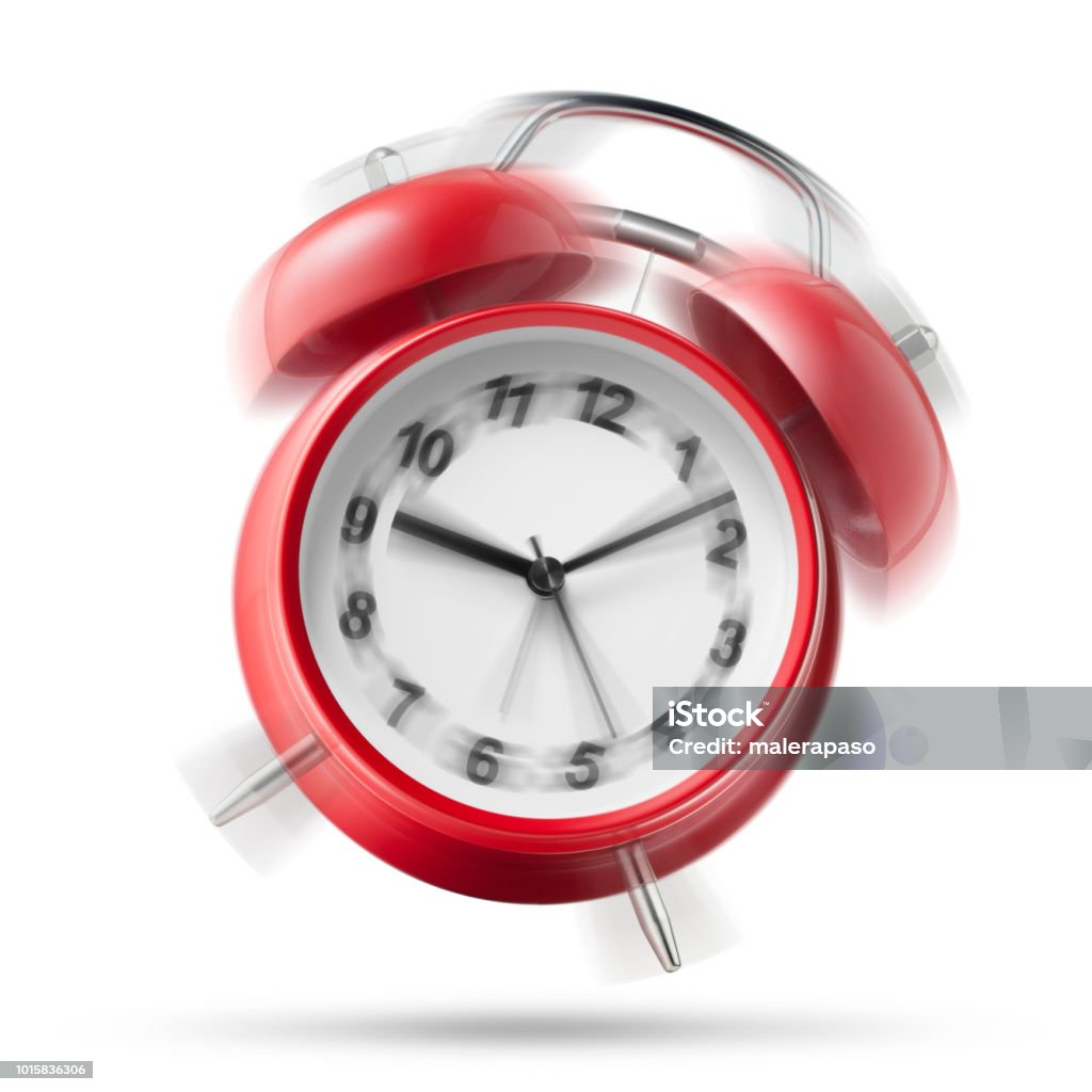 Alarm clock ringing on white background Red alarm clock ringing on white background. Alarm Clock Stock Photo
