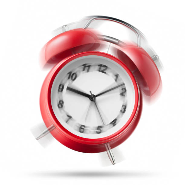 Alarm clock ringing on white background Red alarm clock ringing on white background. alarm clock stock pictures, royalty-free photos & images