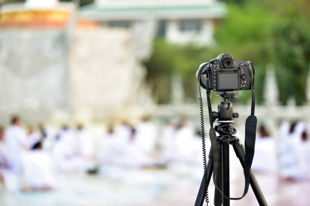 istock Close up image of camera on tripod . 1015844226