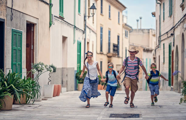 istock Family visiting mediterranean town on Majorca 1015848996