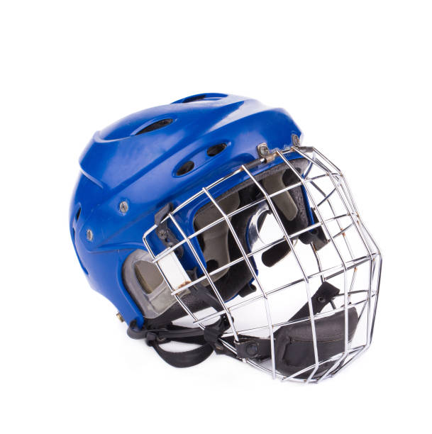 Blue Hockey Helmet. Blue Hockey Helmet. It is isolated in a white background. Close-up. offensive line stock pictures, royalty-free photos & images