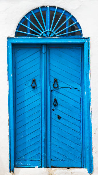 istock Blue door with ornament from Sidi Bou Said in Tunisia 1015852230