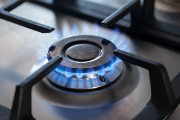 istock kitchen gas cooker with burning fire propane gas 1015852860