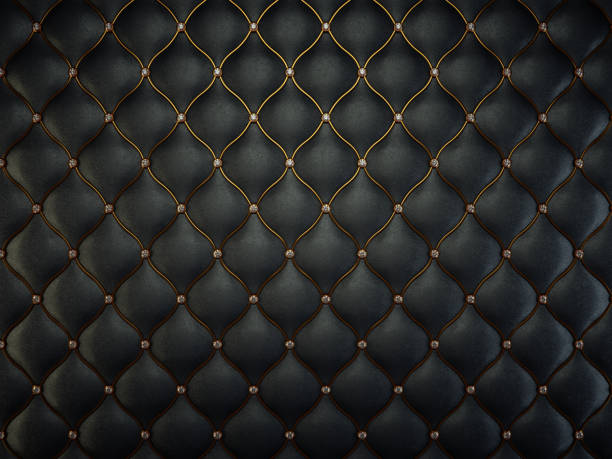 istock Black leather pattern with golden wire and gems. Luxury background 1015855282