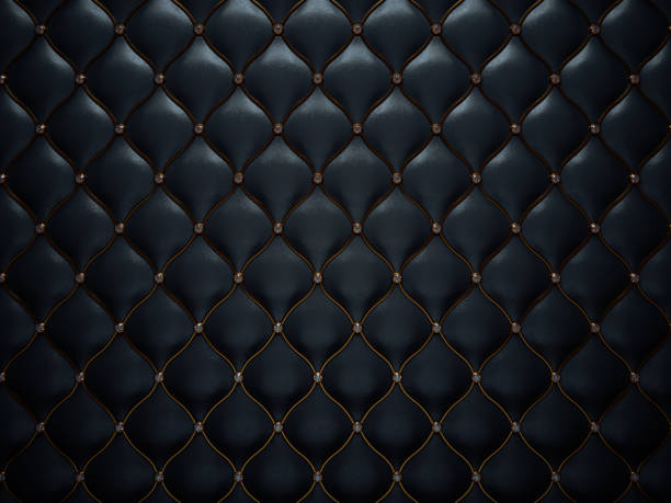istock Black leather pattern with diamonds and golden wire. Comfort and luxury 1015855286