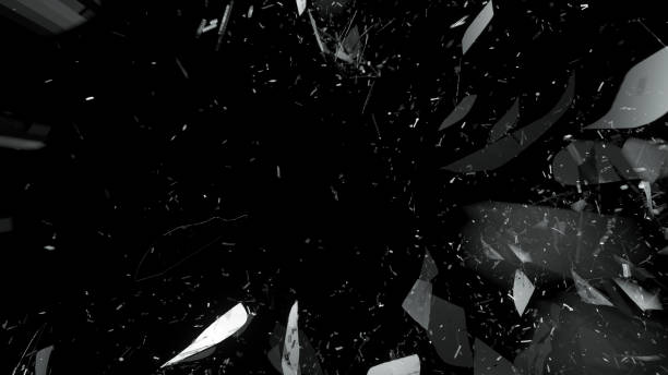 istock Pieces of splitted or broken glass on black 1015855596