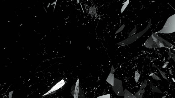 istock Pieces of splitted or broken glass on black 1015855640